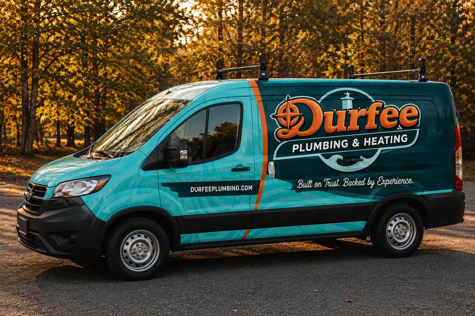 A Durfee Plumbing & Heating service van parked on Cape Cod.