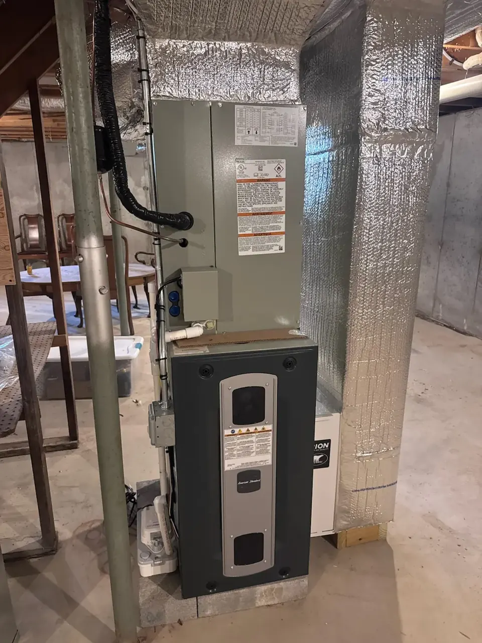 American Standard furnace, indoor cooling coil and insulated ductwork