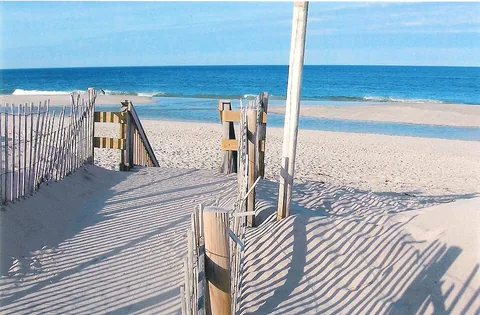 Sandy beach access and the Atlantic Ocean at Nauset Beach in East Orleans