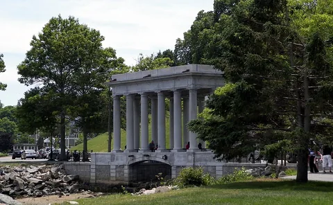 Plymouth Rock monument beside the waterfront in Plymouth, Massachusetts