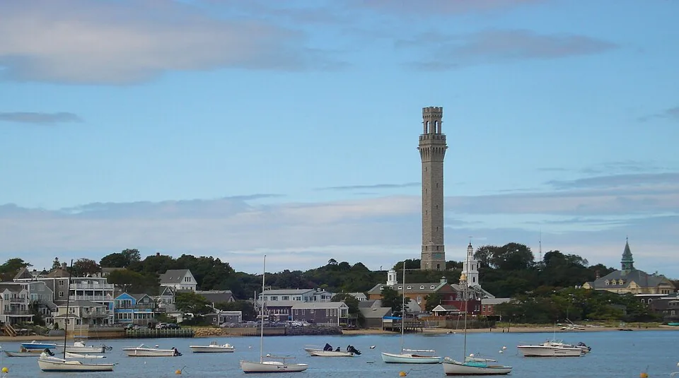 Provincetown waterfront and Pilgrim Monument viewed from the harbor